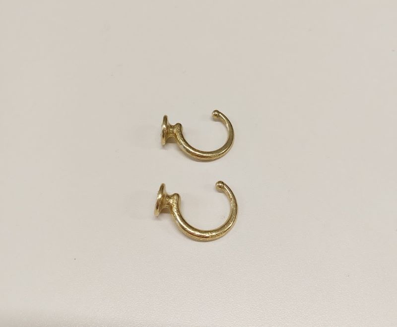 Hook for curtain tiebacks