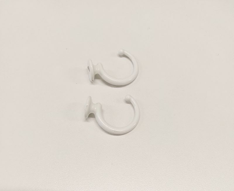 Hook for curtain tiebacks