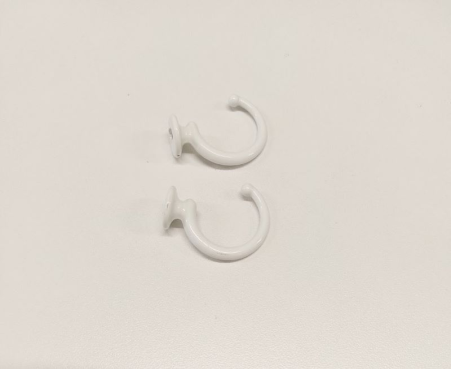 Hook for curtain tiebacks